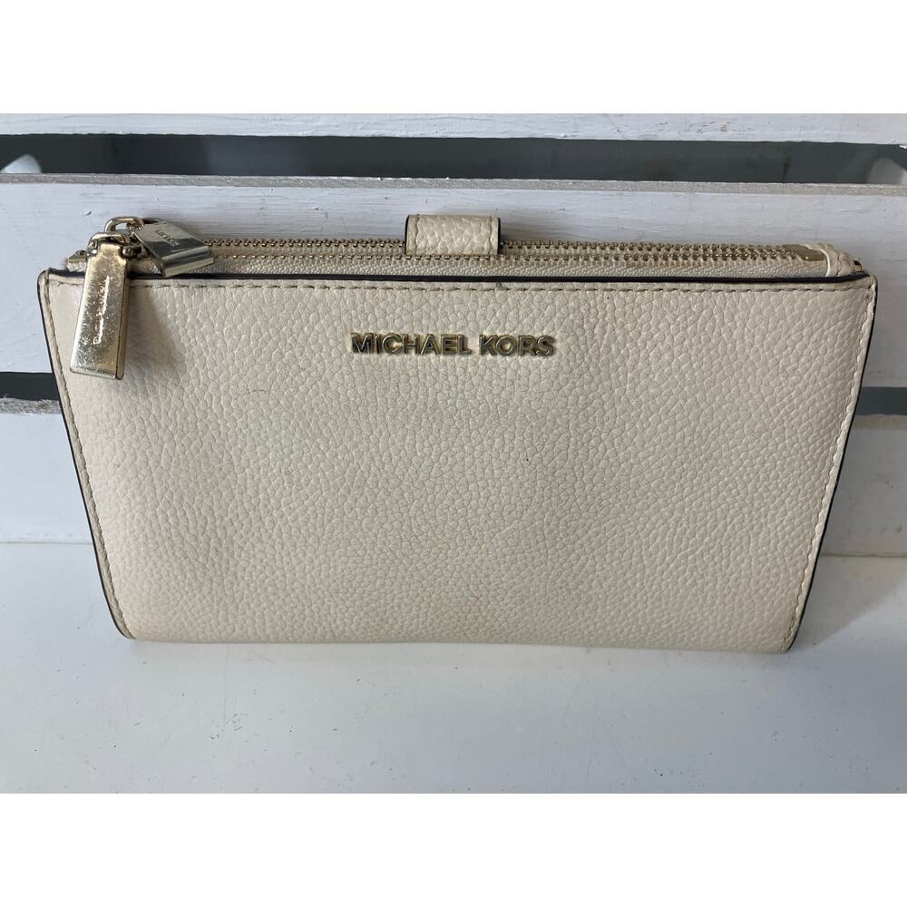 MICHAEL KORS, LARGE IVORY PEBBLED LEATHER WALLET